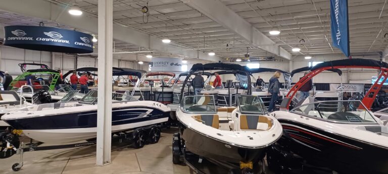 People looking at speed boats during the RV & Boat show in Oshkosh, WI.